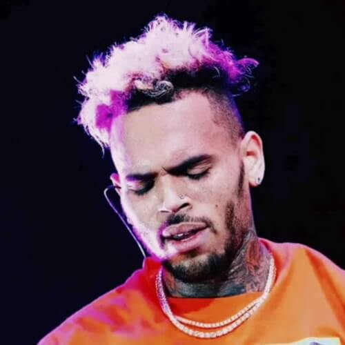 chris brown curly hair with colors highlighted live concert style