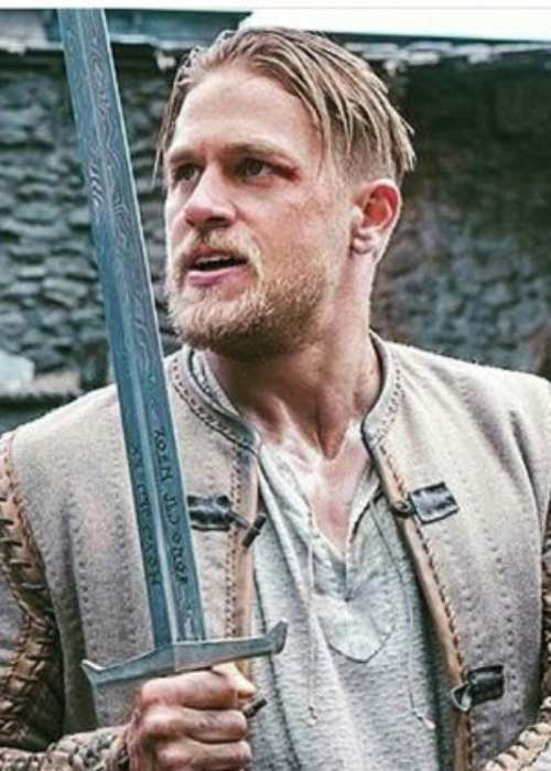 King Arthur Hairstyle with Side Bald Fade.
