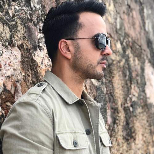 luis fonsi side part fade haircut