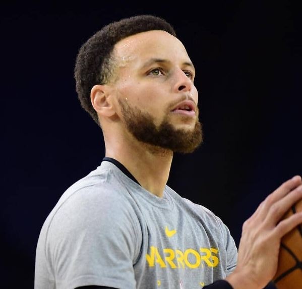 Stephen Curry blowout fade with mid fade and beard style