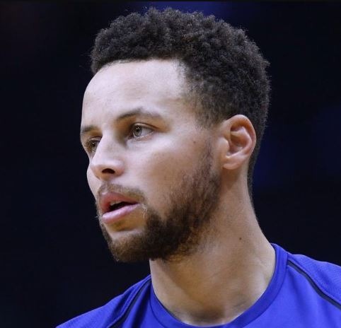 Stephen Curry messy curls with low fade haircut