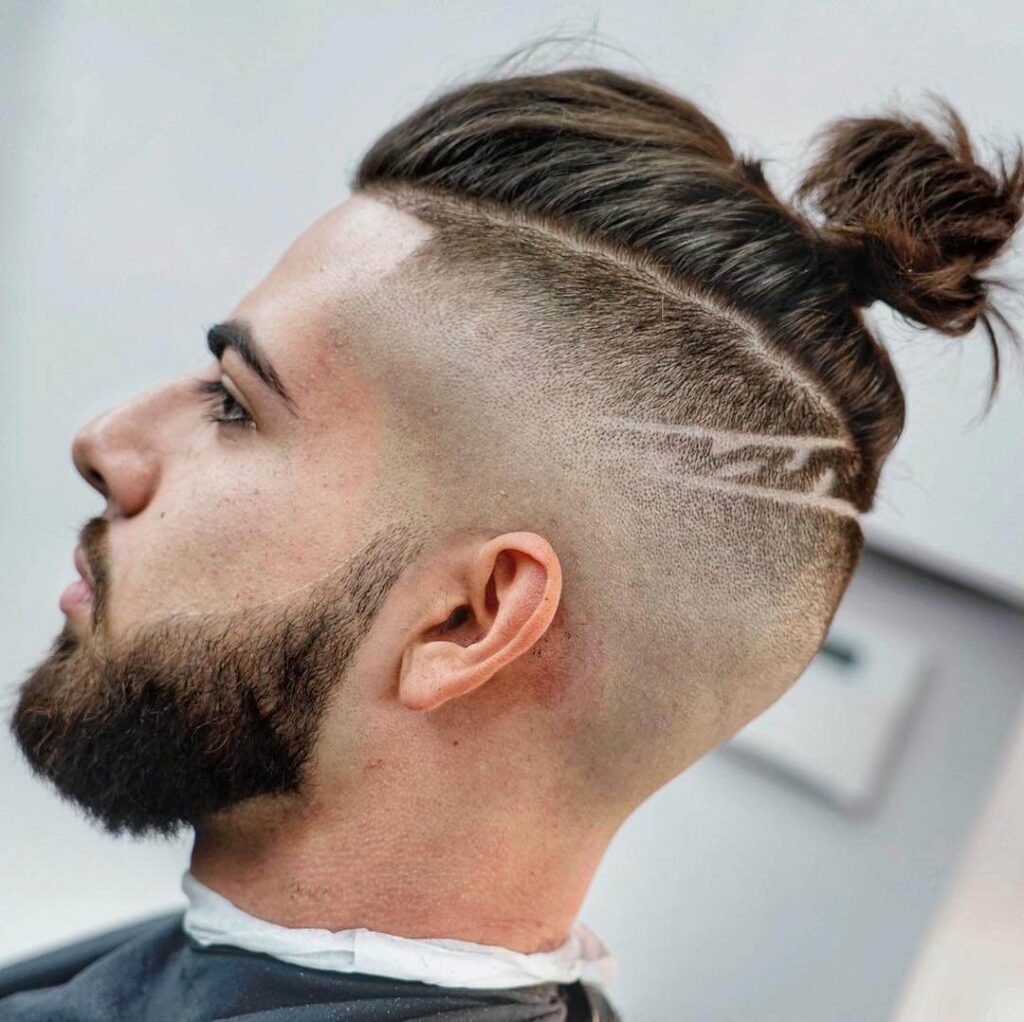 criztofferson bald fade skin mid fade man bun long hair