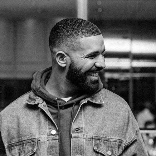 drake haircut side part low fade skin