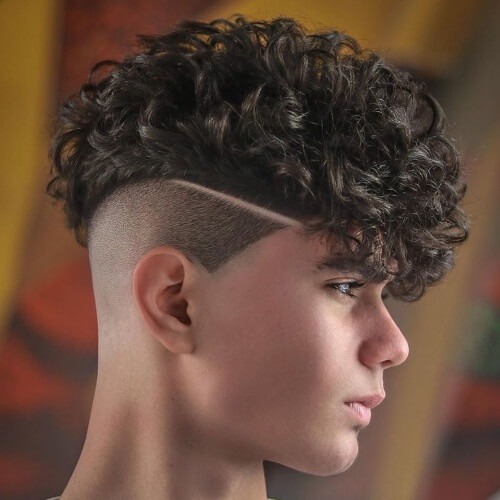 mexican mohawk boys hairstyle with curly hair