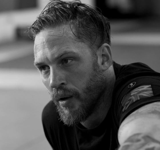 tom hardy hairstyle long hair with side part taper fade