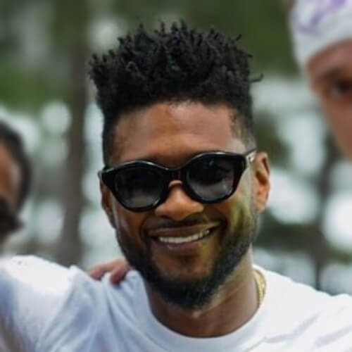 usher pitkä tukka